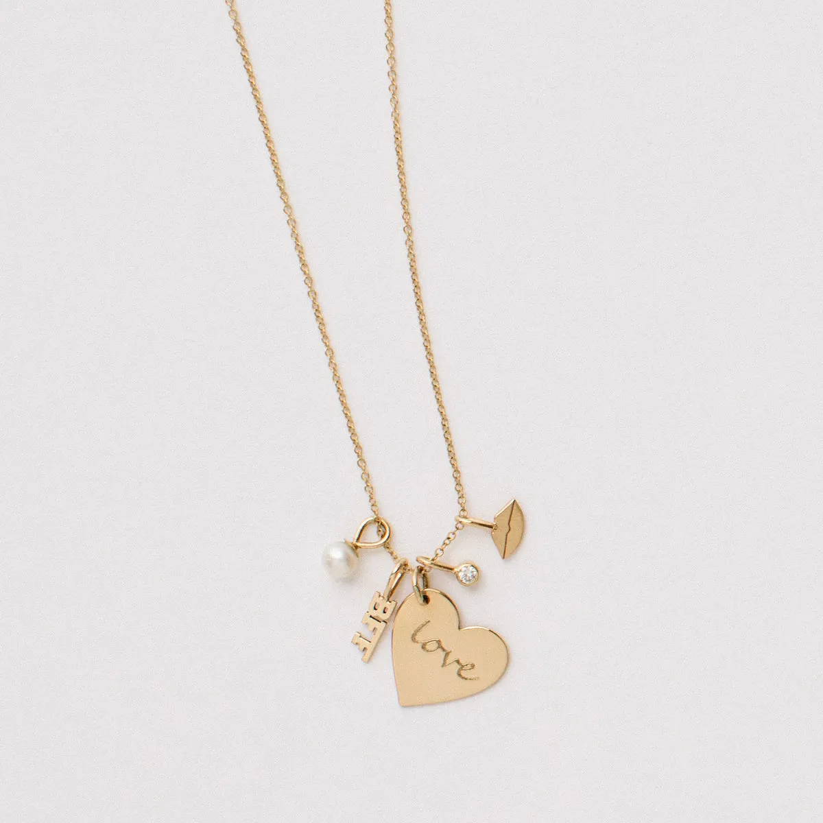 14k Single Itty Bitty BFF Charm