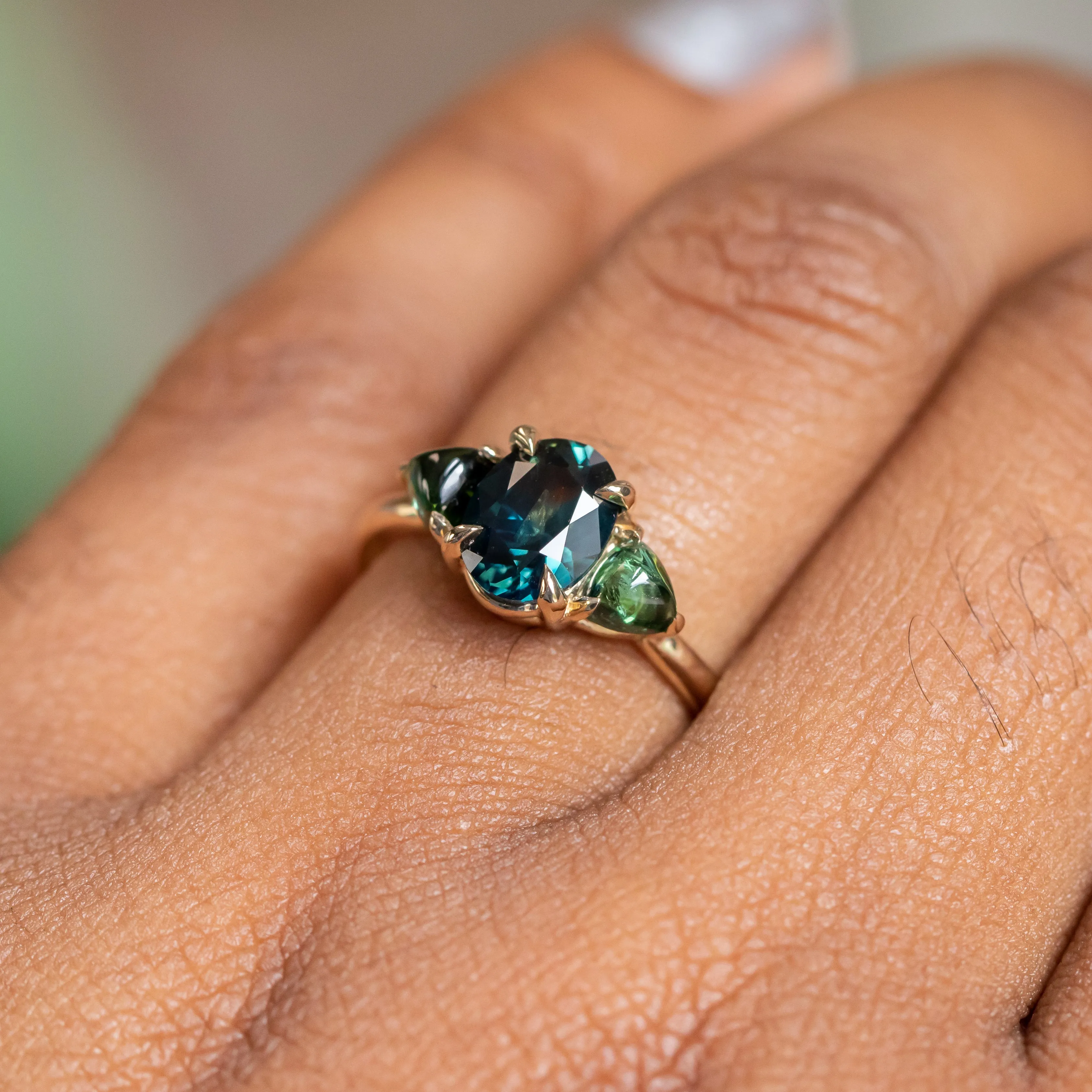 1.63ct Oval African Teal Blue Sapphire and Tourmaline Cabochon Trillion Three Stone Ring in 14K Yellow Gold