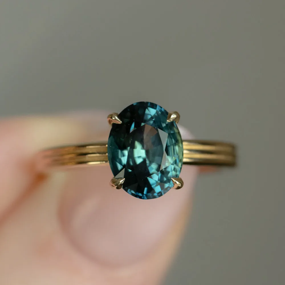 3.59ct Oval Deep Teal Madagascar Sapphire Low Profile Tri-Band Three Winds 4 Prong Solitaire in 14k Yellow Gold