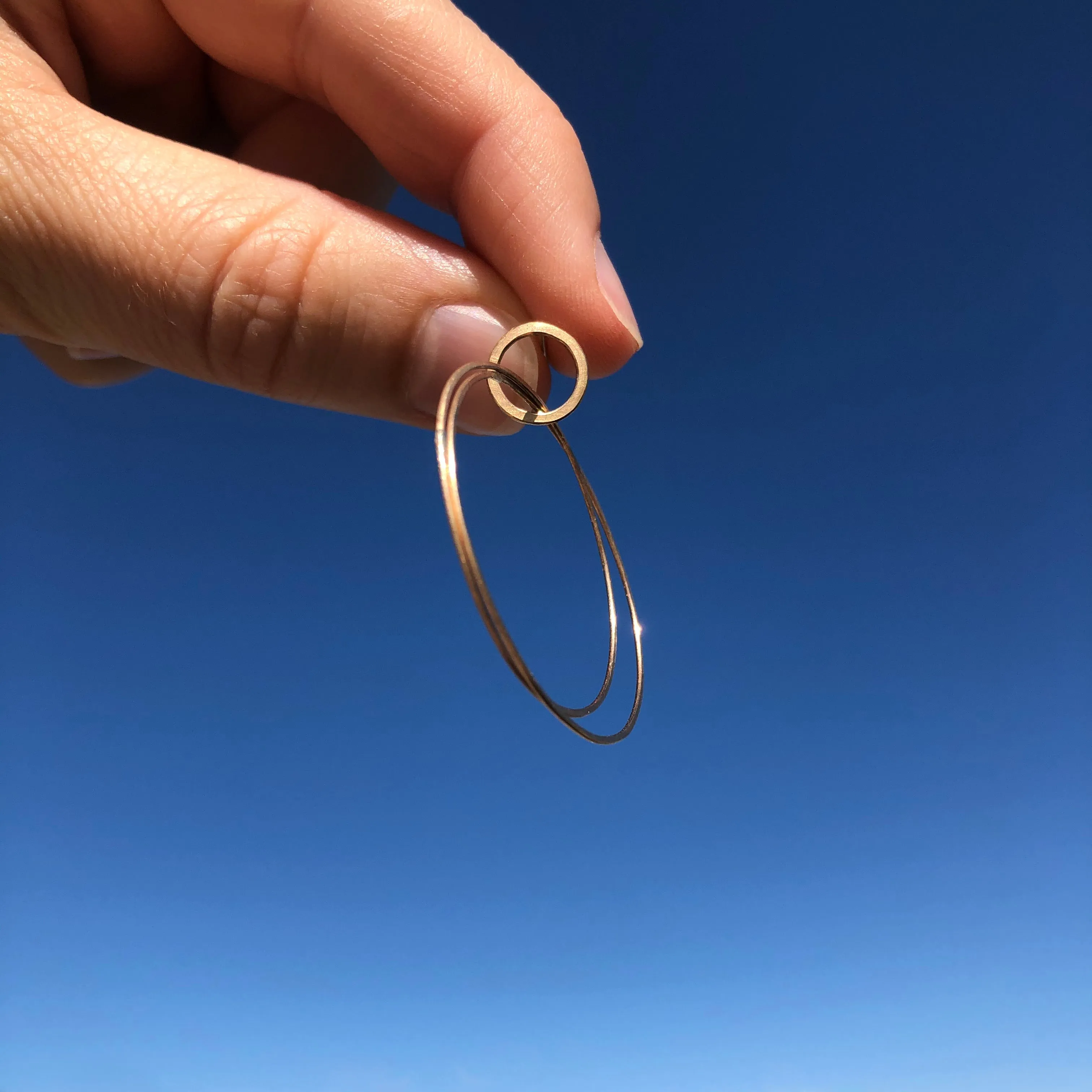 Small double hoop earrings in 10k gold